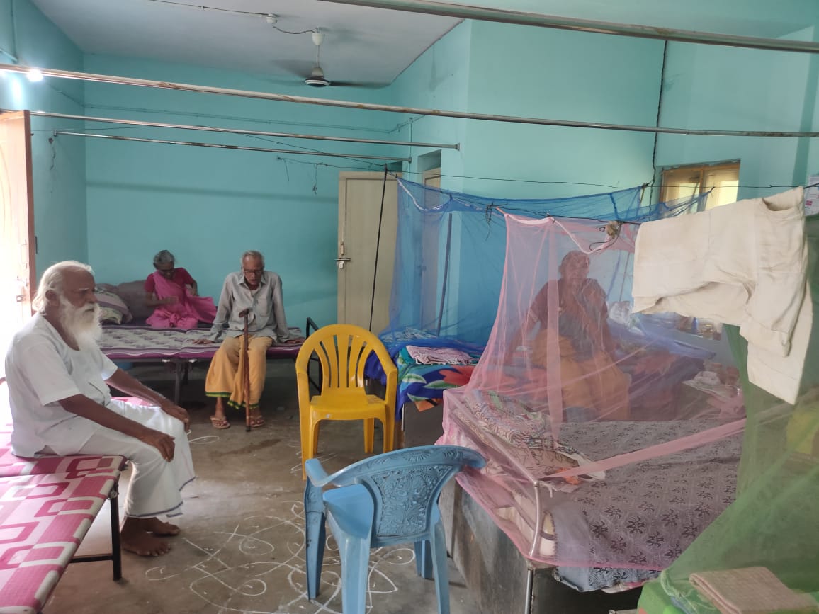 Residents in a shared room at ABCD Old Age Home