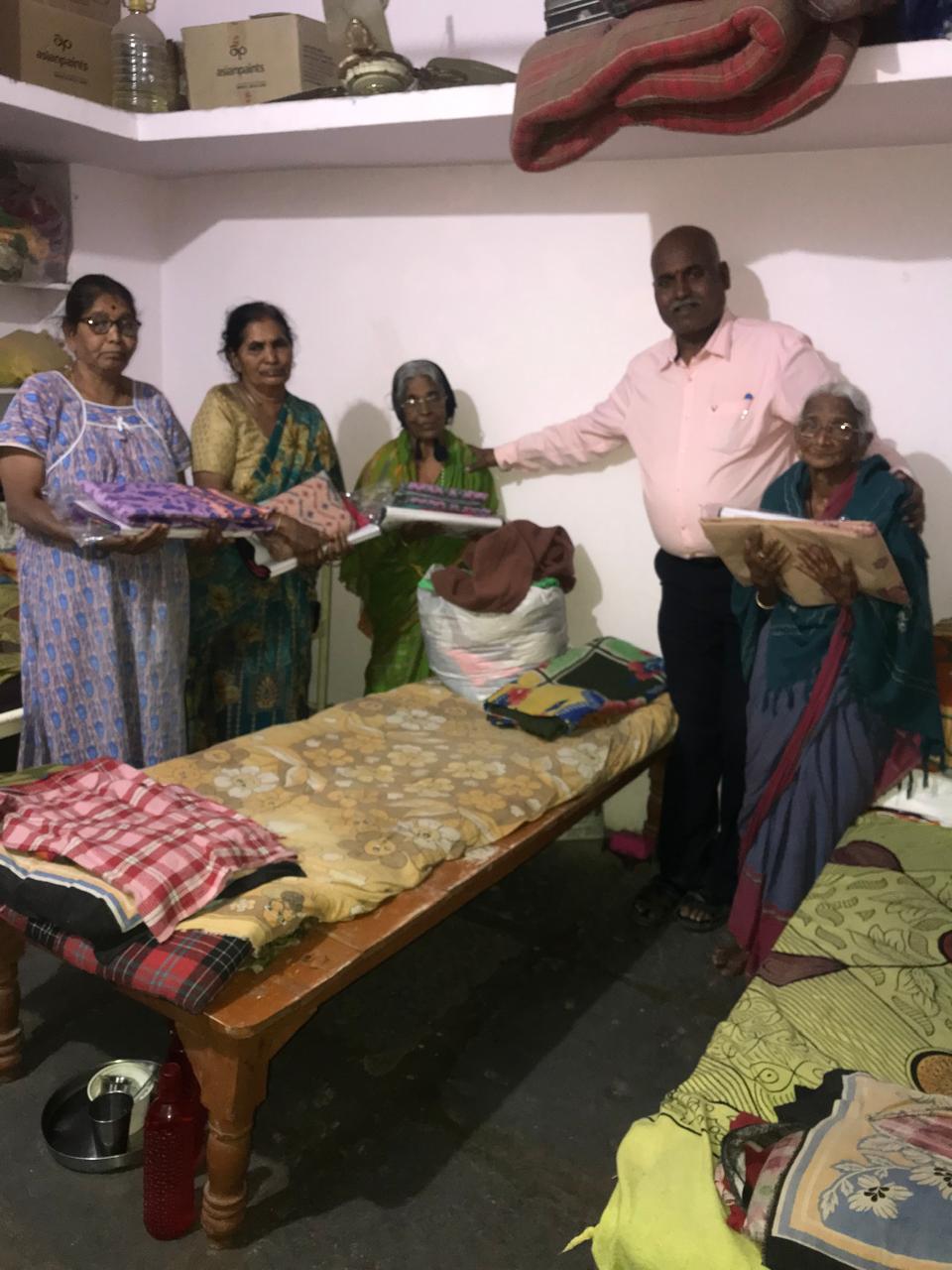 Residents receiving community support at Vruddha Abhaya Trust